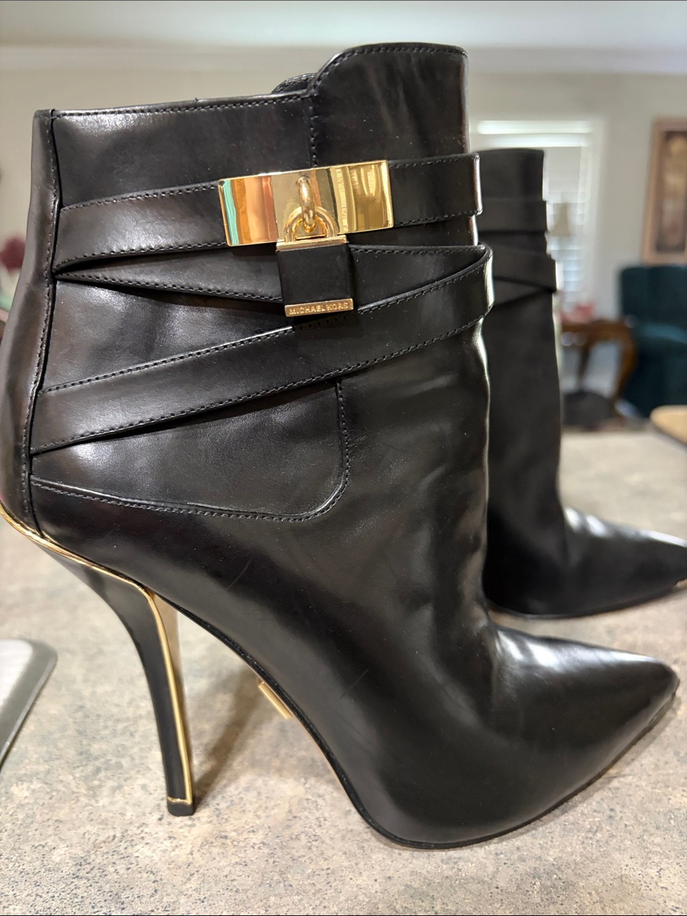 Michael Kors Black Leather Pointed Toe Ankle Boot with Gold Tone Accent